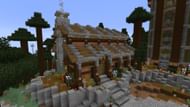 An iron farm fashioned in a factory theme (Image via Mojang)